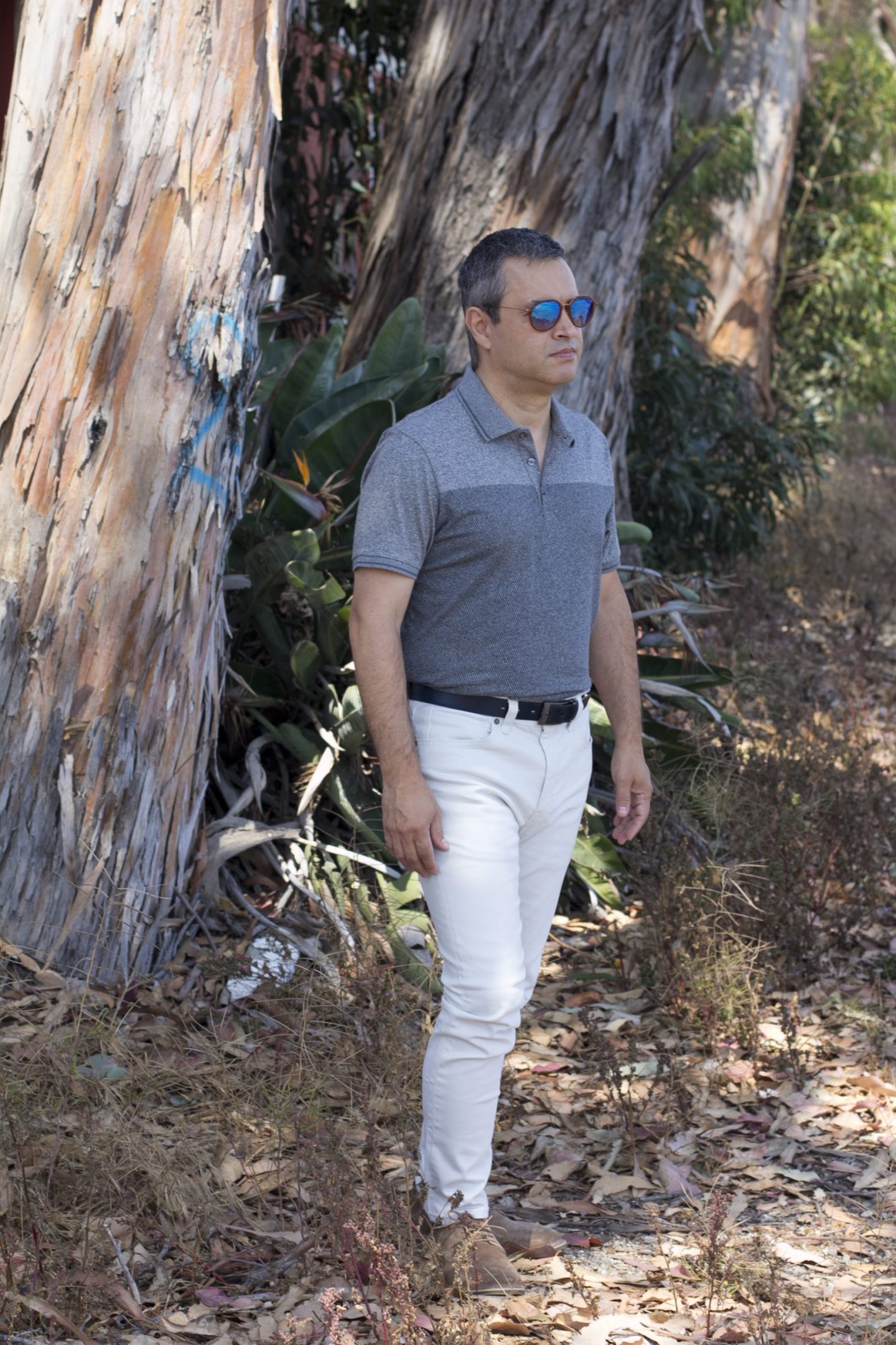 Marks & Spencer cotton blend textured polo shirt, blue leather buckle reversible belt, skinny fit stretch jeans, and suede desert lace-up shoes
